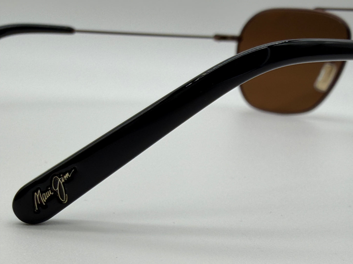 Maui Jim Mano 57mm Dark Brown / Gold Stripe HCL Bronze Polarized Sunglasses H877-01 Italy