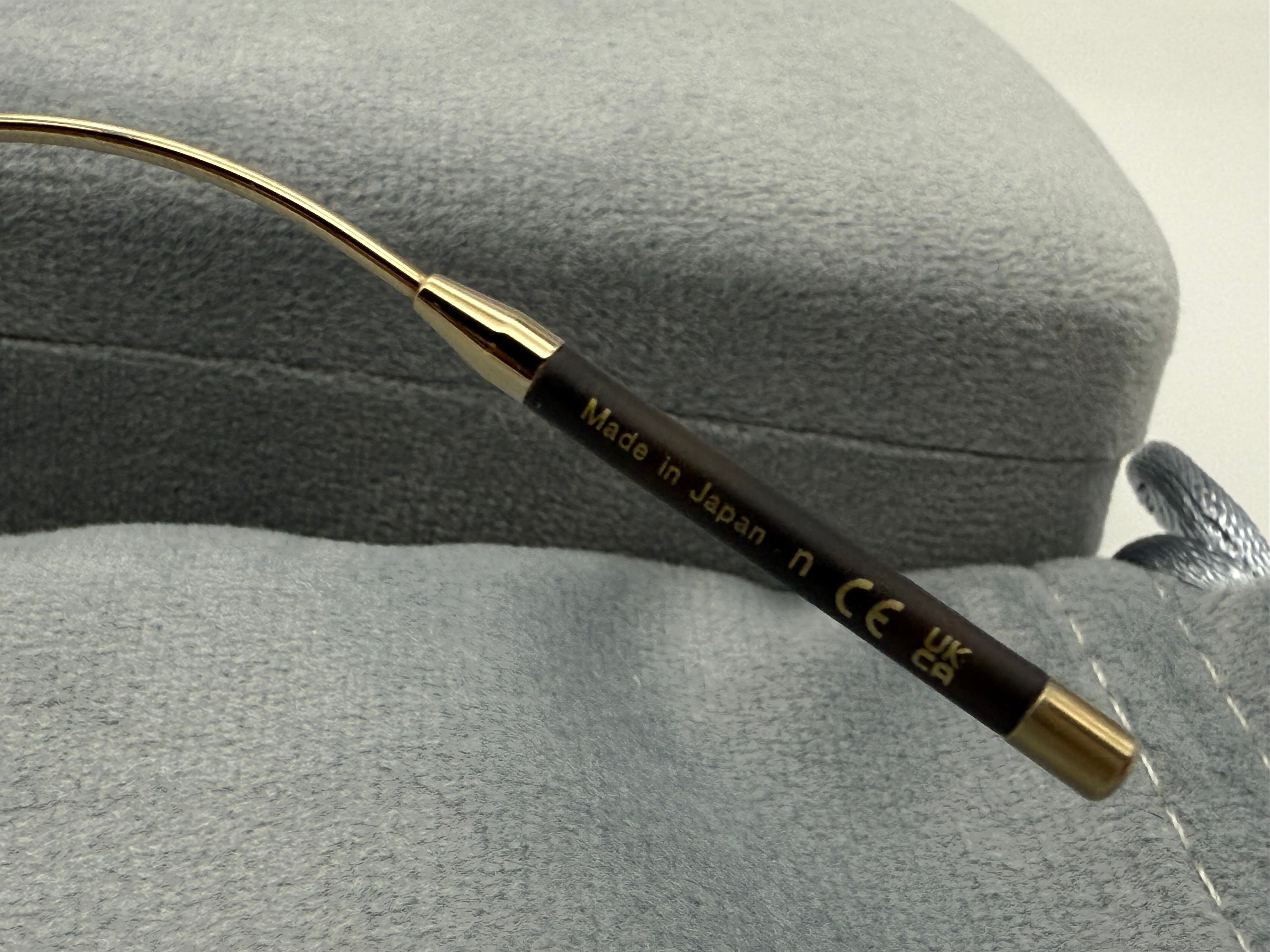 Oliver Peoples TK-8 48mm Titanium Gold / Buff - Demo Lens OV 1318