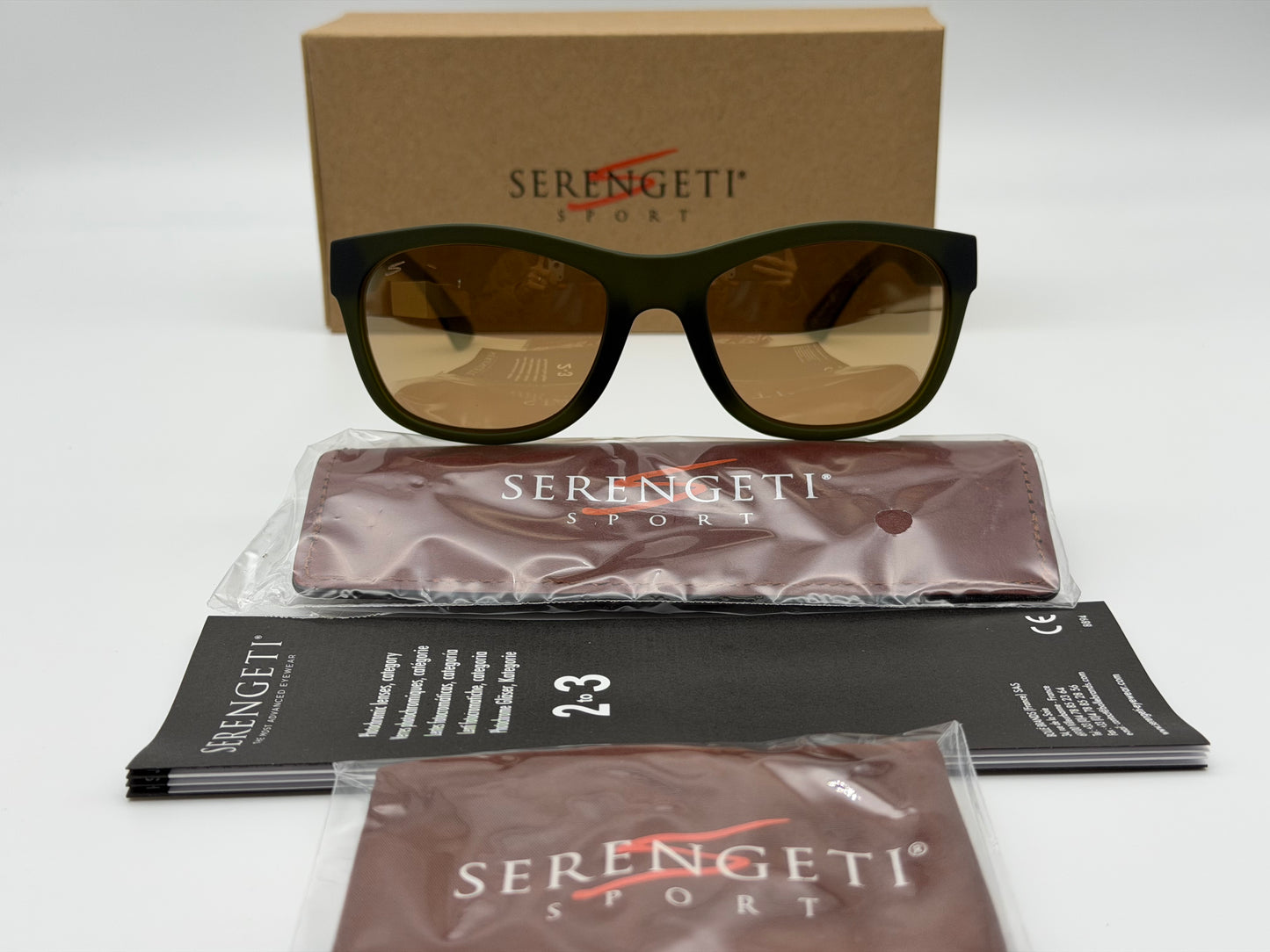 Serengeti Chandler 56mm Soft 
Rubberized Khaki/Drivers Gold Polarized Photochromic SS55702 Italy NEW