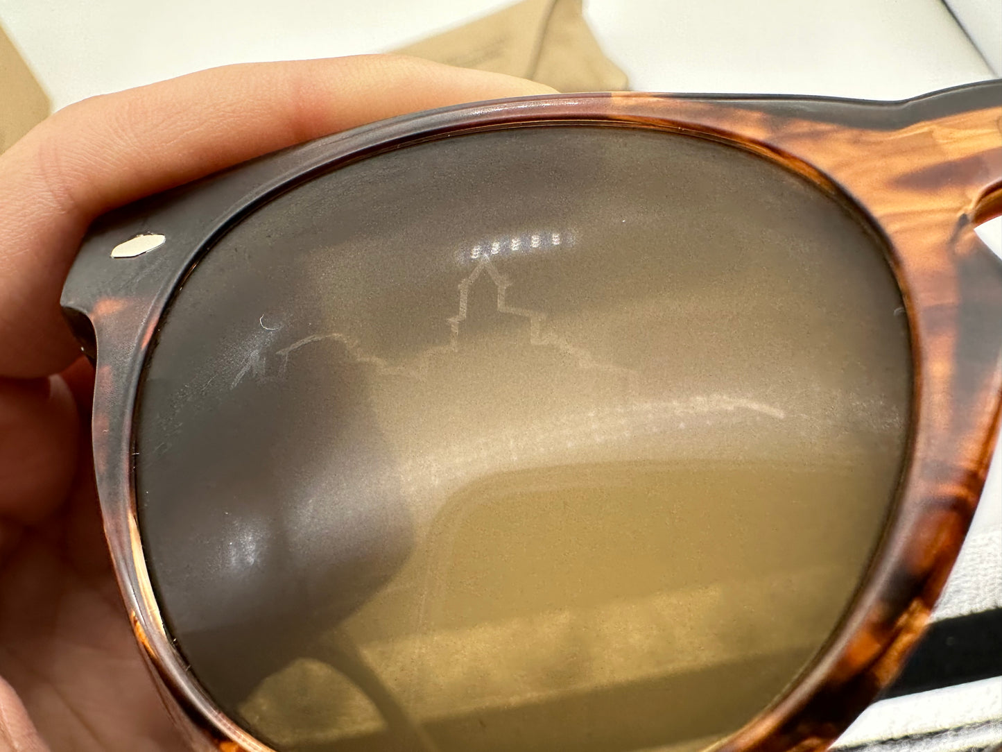 Oliver Peoples Nino Dark Amber Smoke Polarized OV5473SU 172157 Nino 50mm Sunglasses