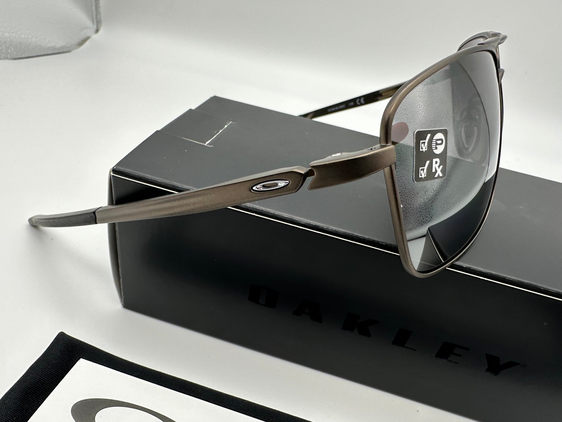 Oakley Gauge 6 57mm Titanium Prizm Black Polarized Pewter Shade